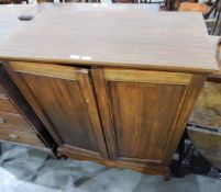 Mahogany two-door dwarf record cabinet complete with collection of vinyl records,