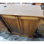 Mahogany two-door dwarf record cabinet complete with collection of vinyl records,