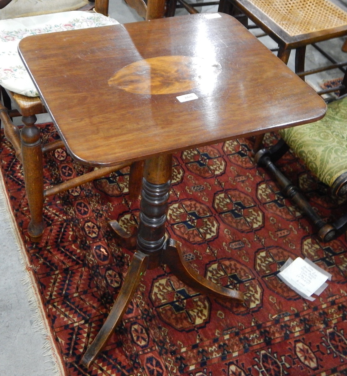 Mahogany tilt-top table on turned pedestal, with outswept tripod supports,