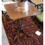 Mahogany tilt-top table on turned pedestal, with outswept tripod supports,