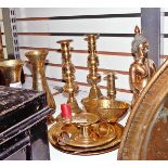 Quantity of brassware including a pair of candlesticks of knopped design, a large brass jam pan,