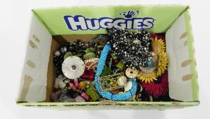 Large quantity of costume jewellery including a flowerhead necklace, bead necklaces,