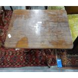 Rectangular mahogany tilt-top table on turned pedestal and tripod supports