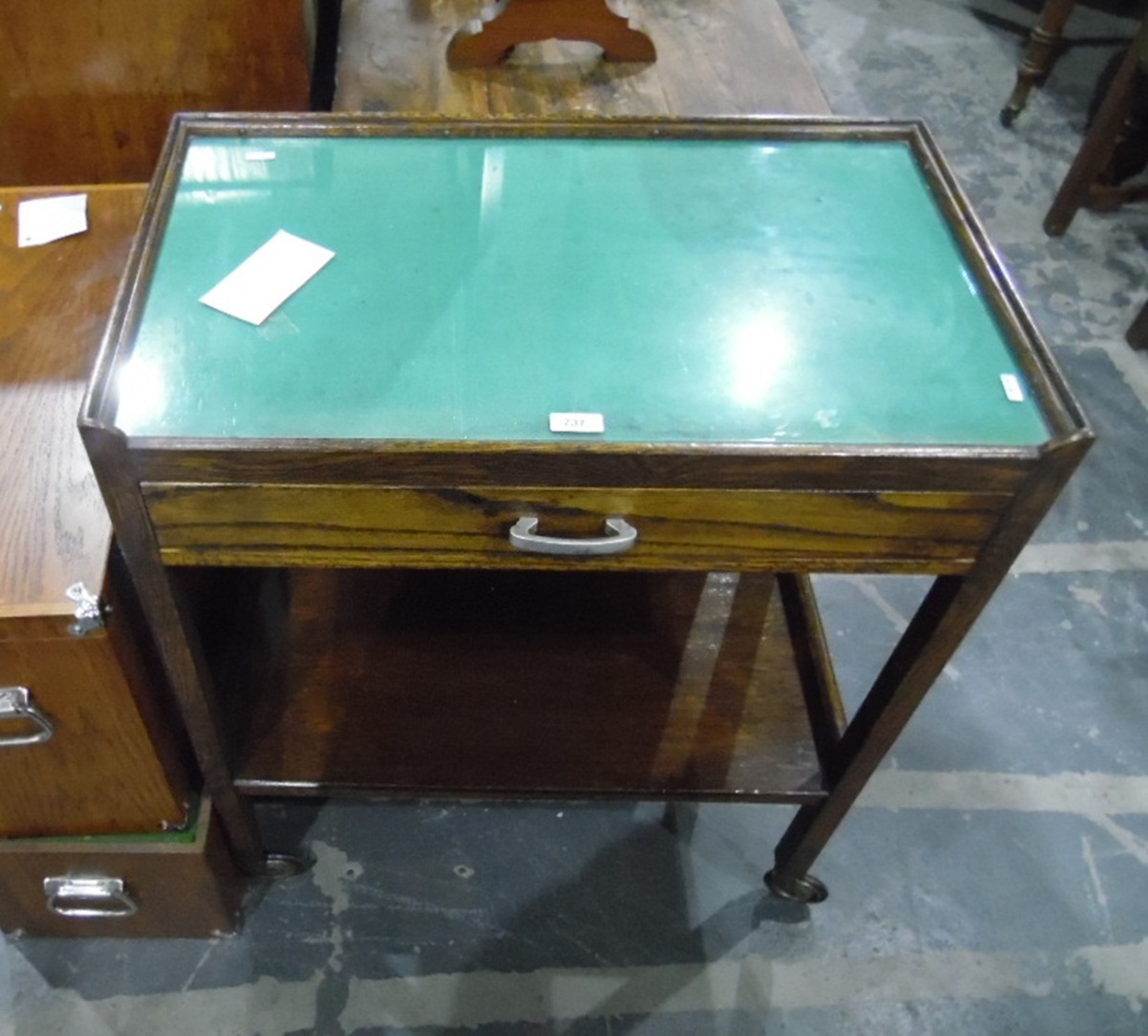 Oak tea trolley with glazed top, frieze drawer with undershelf,