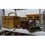 Copper watering can, a beaten copper jug, a small copper and brass planter, a Napoleon table clock,