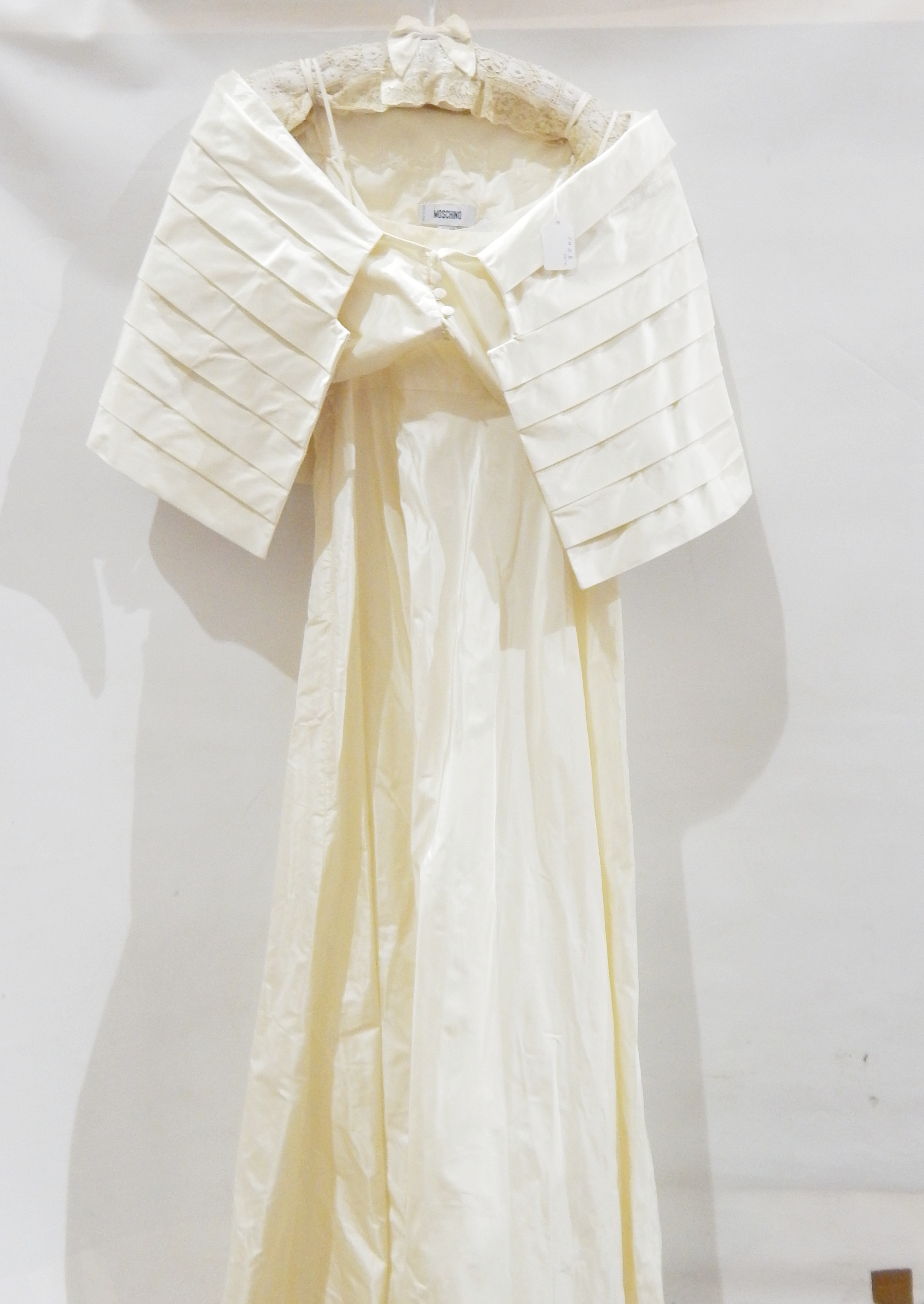 Moschino size 10 stiffened cream silk dress and top with hook and eye and satin button detail,