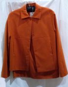 Betty Berkeley orange woollen skirt suit, Betty Berkeley grey suede jeans,