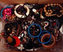 Large quantity of costume jewellery including necklaces, bangles, bracelets, etc.