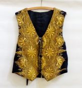 Gentleman's waistcoat in navy blue, heavily embroidered with gold thread (perhaps ceremonial),