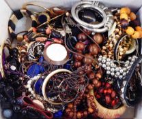 Large selection of costume jewellery including bangles, beads, necklaces, beaded necklaces, etc.