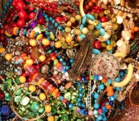 Large quantity of costume jewellery including necklaces, bangles, bracelets, etc.