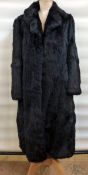 Full-length black coney coat