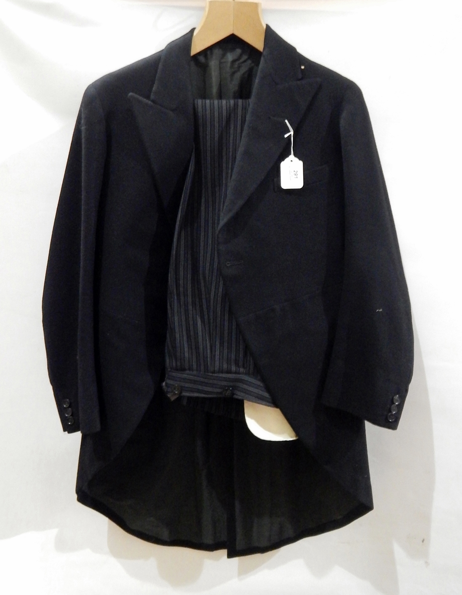 Gentleman's morning suit comprising black coat with grey striped trousers