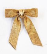 Vintage gilt bow brooch marked 'Christian Dior,