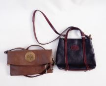 Scotch grain black and tan leather bag marked 'Mulberry' with serial number 865076 on back of a