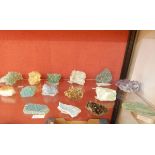 Collection of mineral and rock samples including ruby in zoisite, celestine, dioptase,