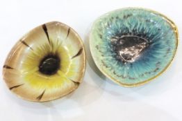 Pair of German Rouleaux triangular-shaped pottery dishes,