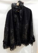 Black wool Victorian cloak, heavily embroidered with ribbon detail,