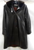 A leather coat labelled Reward London, size 10, detachable fur collar,