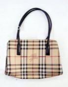 Two Burberry-style handbags and a small Burberry-style purse, a Gucci-style canvas messenger bag,