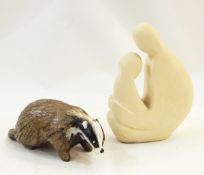 Freeform stoneware Madonna and Child figure and a rustic pottery badger (2)