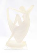 Art Deco style resin figure of a female nude draped in cloth, on a rectangular base,