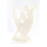 Art Deco style resin figure of a female nude draped in cloth, on a rectangular base,