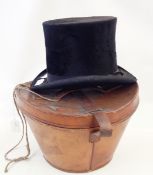 Black top hat within original leather carry case, the hat marked 'Tress & Co, London,