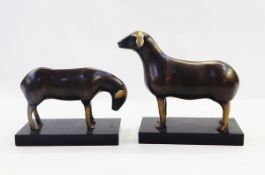 Pair of metal modelled sheep, one grazing..