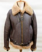 Genuine leather replica of a WWII flying jacket labelled 'The RAF Flying Jacket, genuine sheepskin,