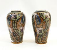 Pair of Royal Doulton stoneware vases decorated by Bessie Newbery, inverse baluster-shaped,