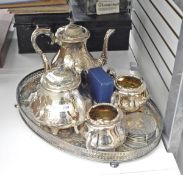 Silver-plated four-piece tea service and oval tray