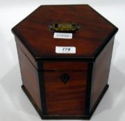 Mahogany hexagonal box with brass handle,