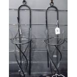 Pair of glass and metal wall sconces