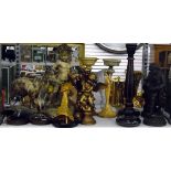 Pair of tall painted wooden candlesticks, a pair of candlesticks modelled as cherubs,