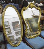 Oval mirror within a gilt frame and another mirror within a gilt frame with shell design and