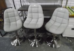 Three adjustable rise and fall breakfast bar chairs by Zuca, having moulded padded seats,