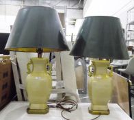 Pair of Oriental-style vase-shaped table lamps on brass plinth bases with brass handles and green