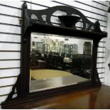 Late Victorian mahogany-framed rectangular wall mirror with bevelled plate, open fretwork back,