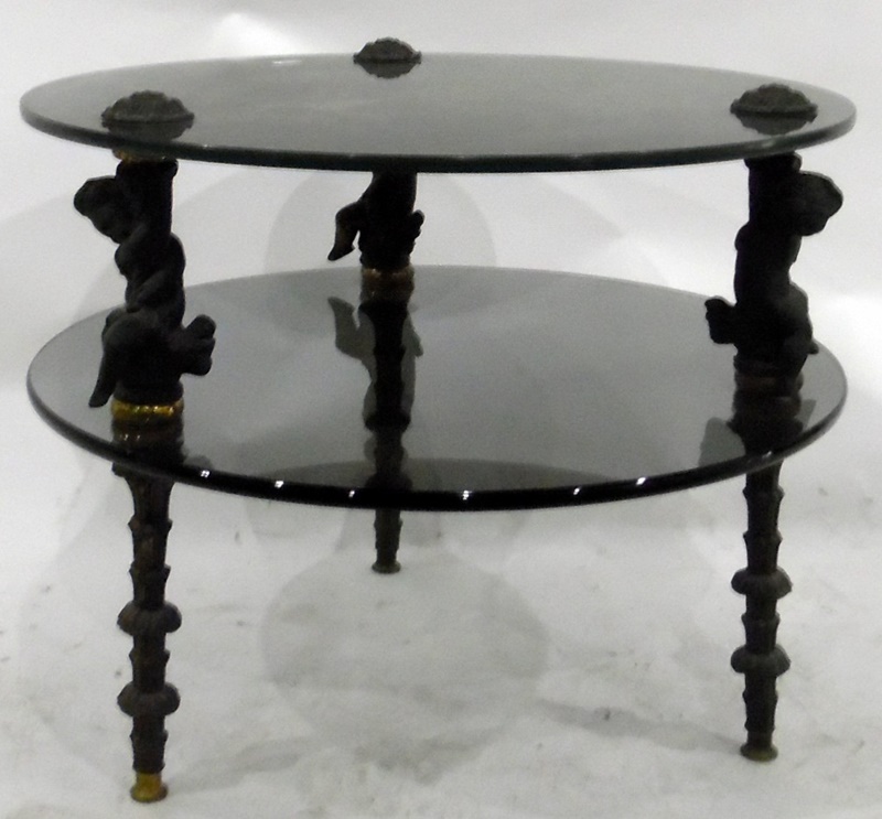 Circular two-tier glass-topped table,