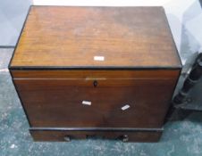 Stained hardwood and ebonised strung coffer/blanket chest, having carved plinth base,