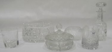 Two decanters (one missing stopper), eight various tumblers,