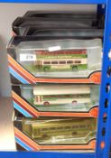 Collection of Exclusive First Edition diecast model buses in window boxes