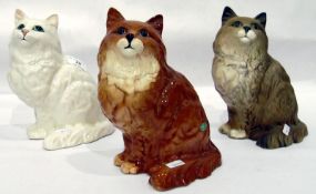 Three Beswick model cats,