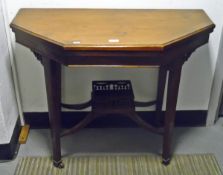 Edwardian mahogany octagonal hall side table having a fret carved galleried under-tier,