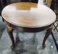 Mahogany extending dining table, oval, on cabriole legs,
