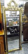 Gilt frame foliate designed rectangular wall mirror with bevelled plate,