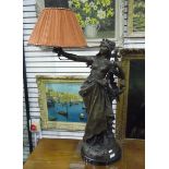 Victorian spelter table lamp in the form of a maiden clutching a harp-type instrument,