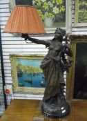 Victorian spelter table lamp in the form of a maiden clutching a harp-type instrument,