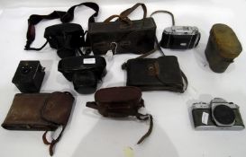 Quantity of cameras and camera equipment to include binoculars, Pentax ME Super camera in case,